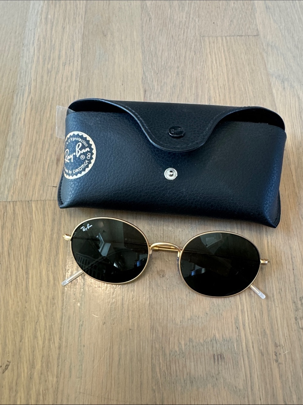 Ray-Bane Gold Frame Sunglasses with Black Lenses
